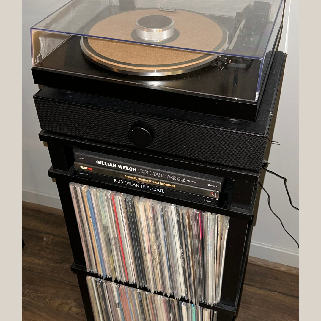 record player with speakers. turntable with speakers. turntable on top of speakers. best all in one record player.