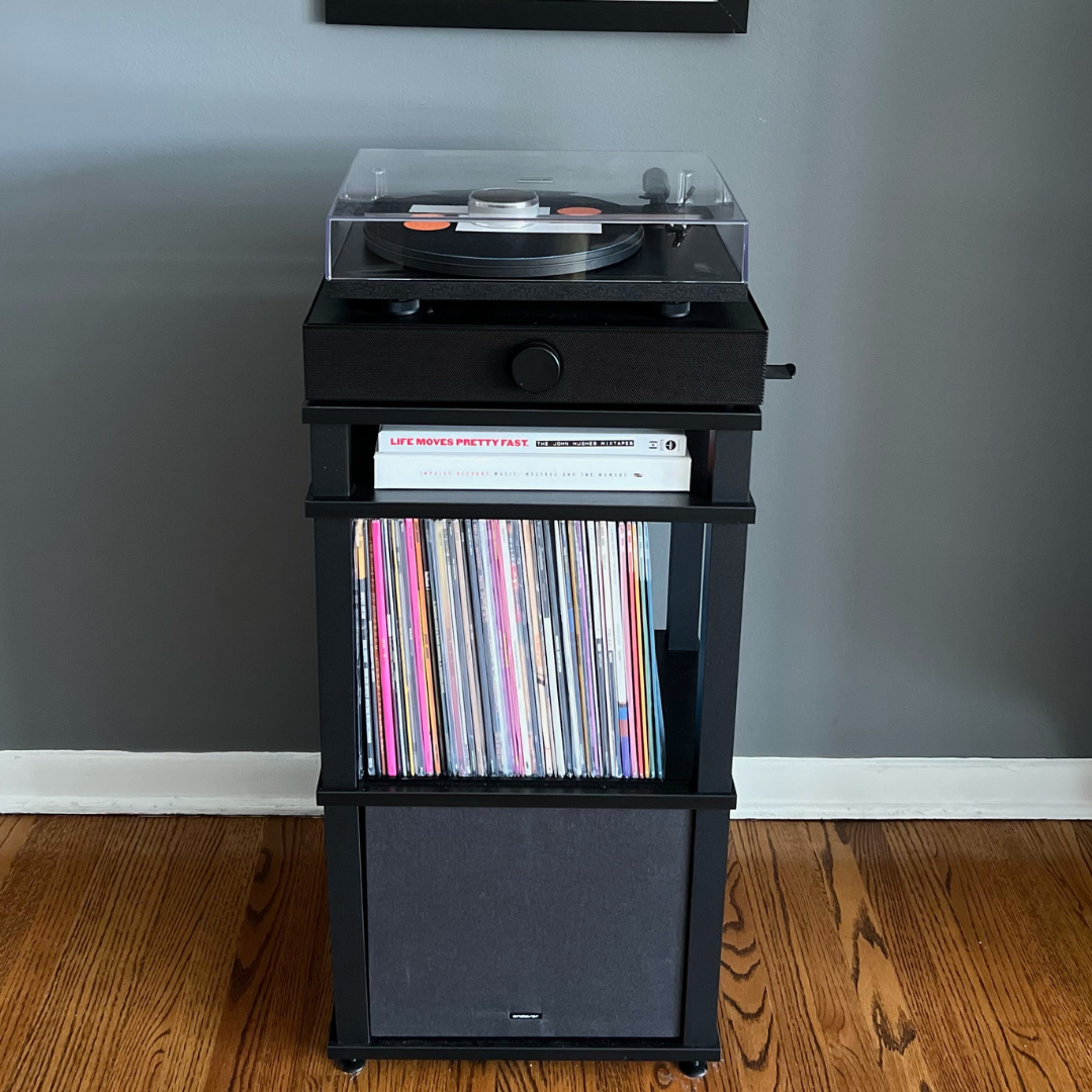 record player with speakers. turntable with speakers. turntable on top of speakers. best all in one record player.